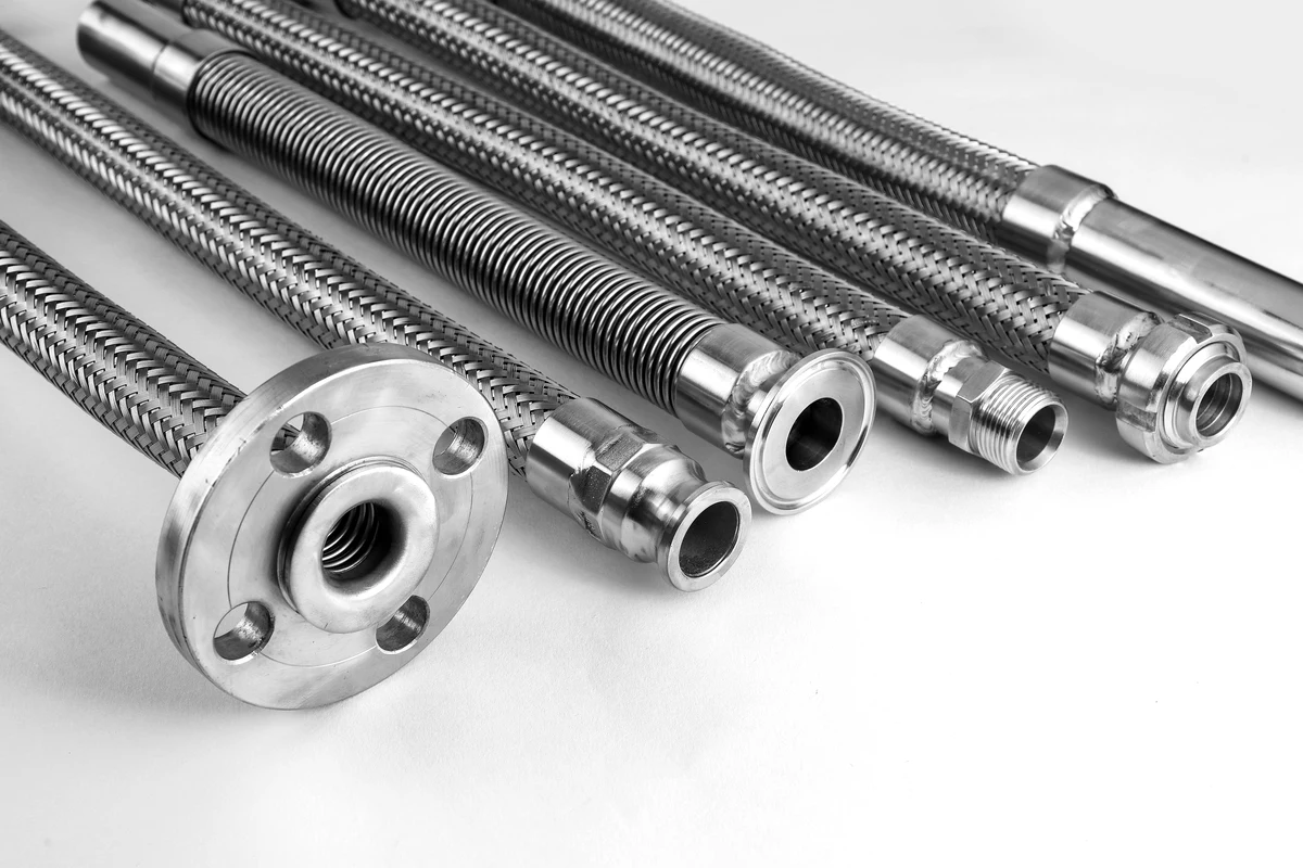 Stainless steel hose assemblies with flanged, tri-clamp, threaded and hex end fittings made to customer drawings